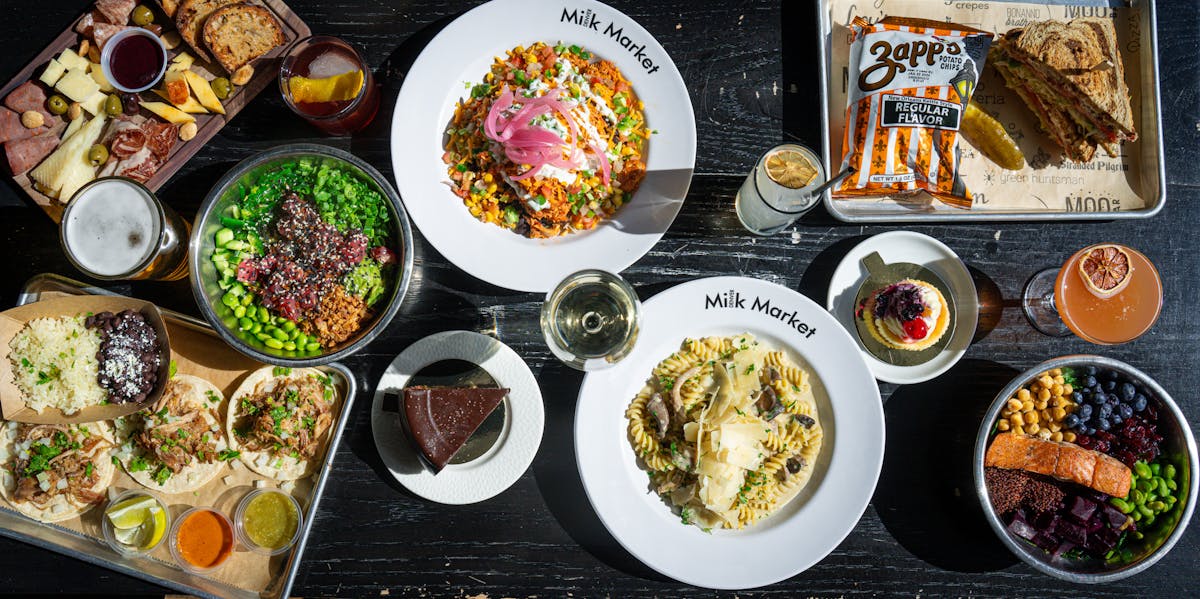 a box filled with different types of food on a plate